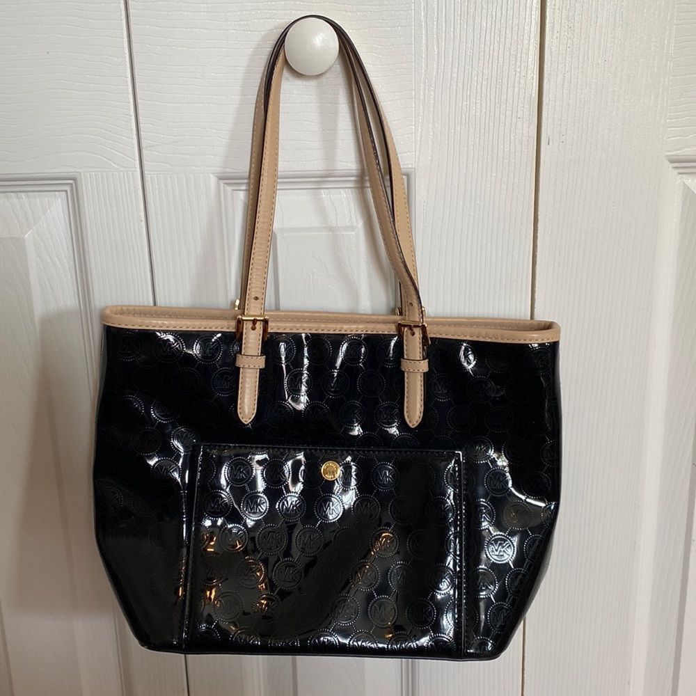 Patent Leather Michael Kors Bag with Tan Leather Straps.